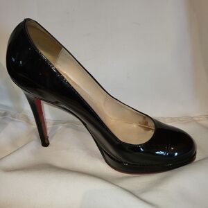 Size 37 Christian Louboutin black, patent heels.